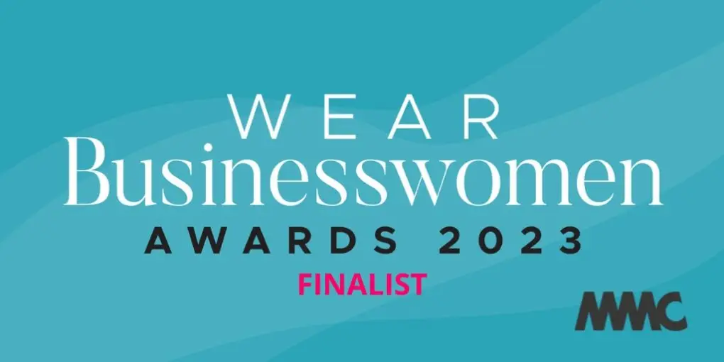WEAR Businesswomen logo on blue background, with FINALIST written in pink.