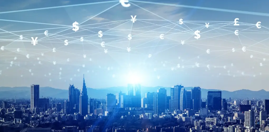 Digital image of a city landscape with the sky filled with currency icons joins with lines. The photo has a blue hue and an artificial sun-like glow in the middle.
